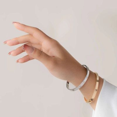 دستبند النگویی طلا زنانه کارتیه پیچ 